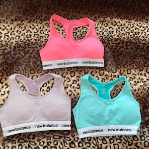 Sports bras pink teal and light purple